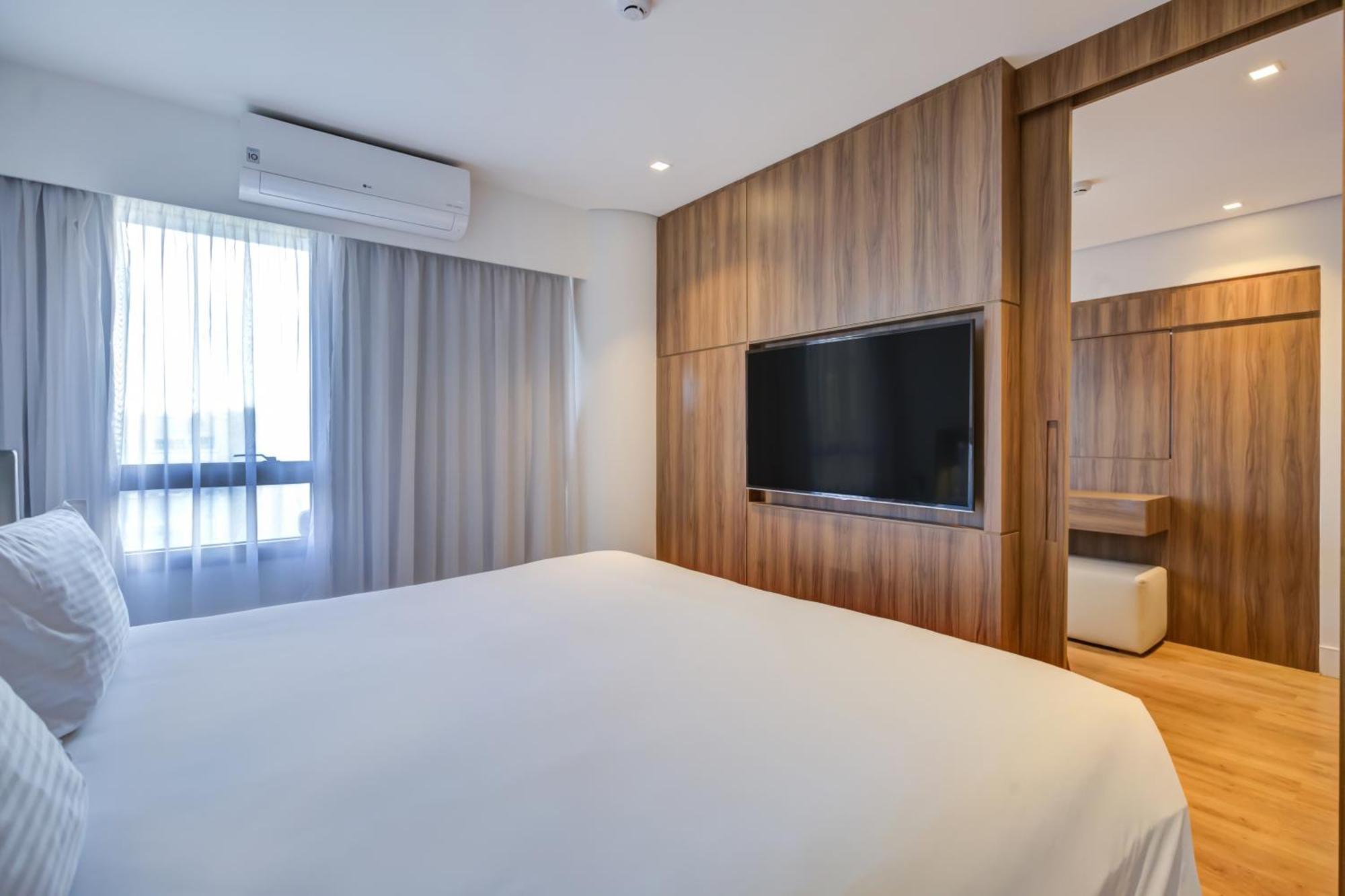 Radisson Sao Paulo Paulista Hotel Luaran gambar A bedroom at the hotel